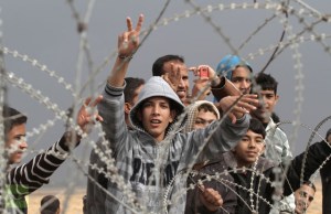palestinian-youths-security-fence